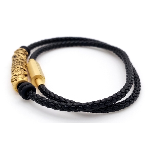 179 - A Lao Miao 24K Gold nugget charm Braided Bracelet. Black braided cord with 24K gold decorative barre... 