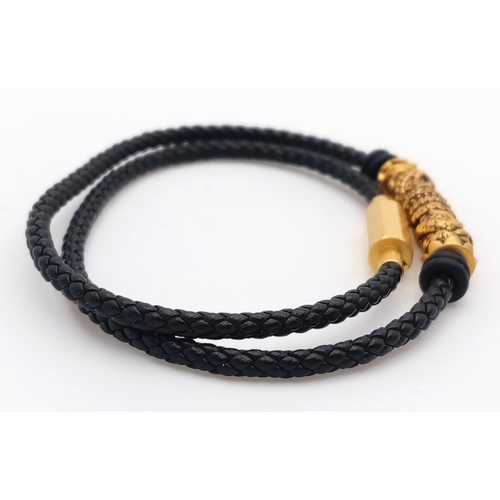179 - A Lao Miao 24K Gold nugget charm Braided Bracelet. Black braided cord with 24K gold decorative barre... 