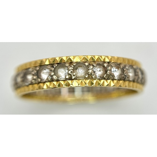 291 - AN 18K GOLD AND DIAMOND FULL ETERNITY RING .     3.4gms        size S