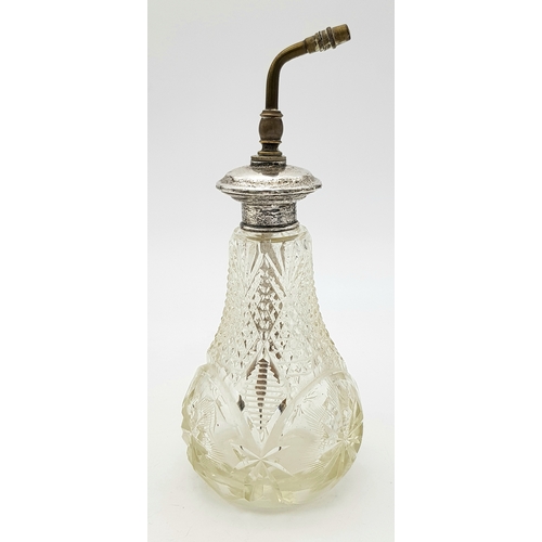 411 - A Vintage Possibly Antique Cut Glass Perfume Atomiser - With Sterling Silver Collar and top. Brass m... 