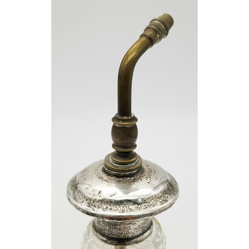 411 - A Vintage Possibly Antique Cut Glass Perfume Atomiser - With Sterling Silver Collar and top. Brass m... 