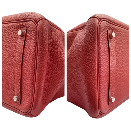 60 - A Red Hermès Birkin 35 Handbag. Red leather exterior with silver-toned hardware, dual rolled leather... 