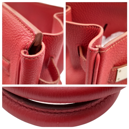 60 - A Red Hermès Birkin 35 Handbag. Red leather exterior with silver-toned hardware, dual rolled leather... 