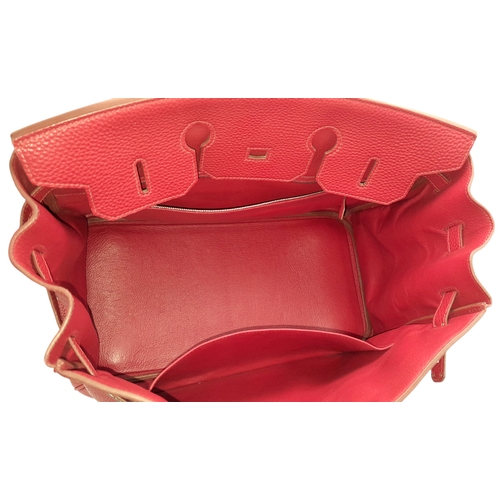 60 - A Red Hermès Birkin 35 Handbag. Red leather exterior with silver-toned hardware, dual rolled leather... 