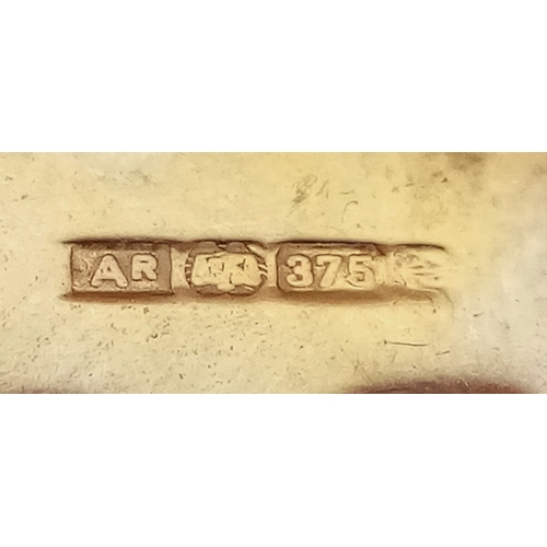 374 - A PAIR OF JIGSAW SHAPED CHAIN LINKED CUFFLINKS IN 9K GOLD .      4.5gms