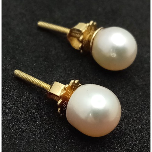 167 - A Pair of 18K Gold and Pearl Stud Earrings. Pearl - 6/7mm. 2g total weight.