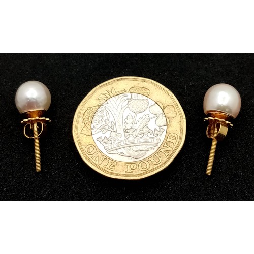 167 - A Pair of 18K Gold and Pearl Stud Earrings. Pearl - 6/7mm. 2g total weight.