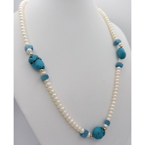 496 - A 14K Gold and Freshwater Pearl Beaded Necklace. 4/5mm rondelles. Turquoise accents. 42cm. 15.7g. MT... 