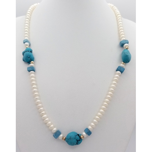496 - A 14K Gold and Freshwater Pearl Beaded Necklace. 4/5mm rondelles. Turquoise accents. 42cm. 15.7g. MT... 