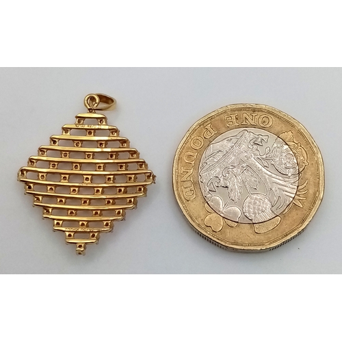 510 - An 18K Yellow Gold Diamond Cluster Pendant. 48 diamonds on 13 levels. 3cm. 2.6g total weight. MT73.