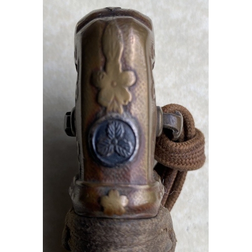 100 - A One Million Yen Japanese Sword with Silver Mon. A WWII Japanese army officer's sword with the kabu... 