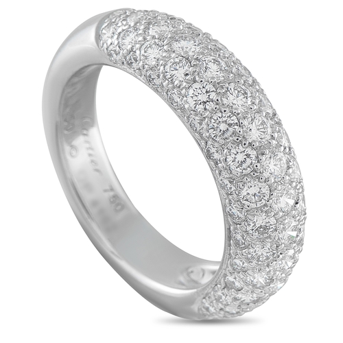 A Cartier Mimi 18K White Gold Diamond Ring. The curved 18K White Gold setting beautifully showcases sparkling inset Diamonds, which cover the top of the design. Features a 3mm wide band and a 3mm top height.  Good condition and includes a gift box. Ring size: 5.25 (UK size I½). Total weight: 6.2 grams. *This item is held at Cadmore USA Office in Pennsylvania, USA and will be shipped from there. Buyers will be responsible for direct shipping payments.*