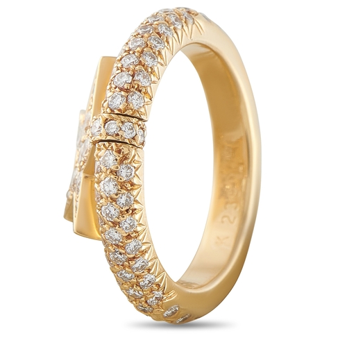 20 - A Chanel 18K Yellow Gold Diamond Ring with a diamond cluster hanging star charm.  3mm wide band and ... 