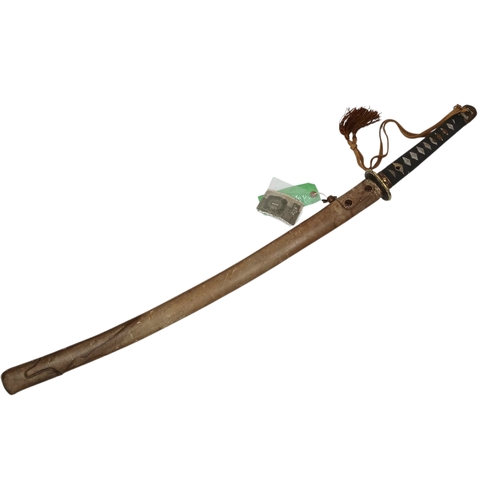 15 - WW2 Japanese Officers Katana Sword. Complete with knot and leather scabbard cover. Brought back from... 