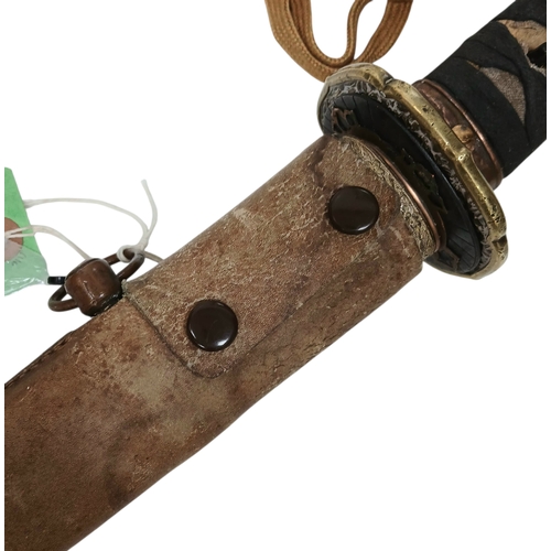 15 - WW2 Japanese Officers Katana Sword. Complete with knot and leather scabbard cover. Brought back from... 