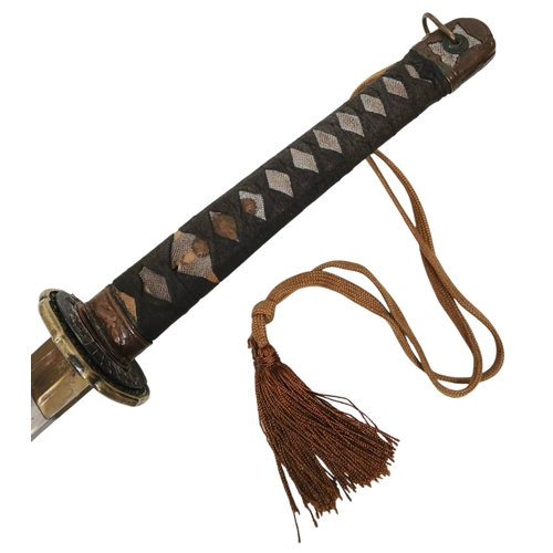 15 - WW2 Japanese Officers Katana Sword. Complete with knot and leather scabbard cover. Brought back from... 