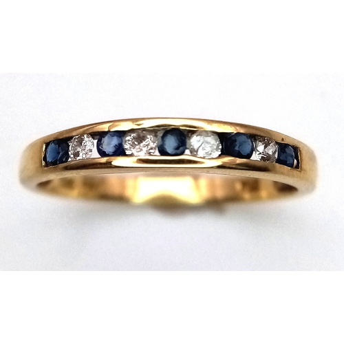 488 - AN 18K YELLOW GOLD, DIAMOND AND SAPPHIRE, HALF ETERNITY RING. 1.9G, SIZE N. SC 7078