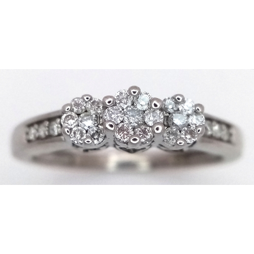 495 - A 9K WHITE GOLD, DIAMOND SET, TRIPLE CLUSTER RING. 0.25 CTW, 2.1G, SIZE J. SC 7038