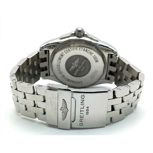 31 - A Breitling Galactic Unitime Automatic Gents Watch. Model WB3510. Stainless steel bracelet and case ... 