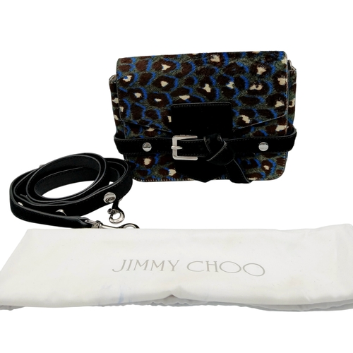 491 - A Jimmy Choo Leopard Print Clutch/Shoulder Bag. Pony hair exterior with silver-toned hardware and ma... 