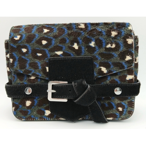 491 - A Jimmy Choo Leopard Print Clutch/Shoulder Bag. Pony hair exterior with silver-toned hardware and ma... 