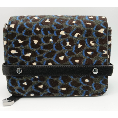 491 - A Jimmy Choo Leopard Print Clutch/Shoulder Bag. Pony hair exterior with silver-toned hardware and ma... 
