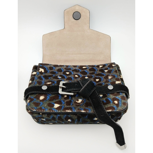 491 - A Jimmy Choo Leopard Print Clutch/Shoulder Bag. Pony hair exterior with silver-toned hardware and ma... 