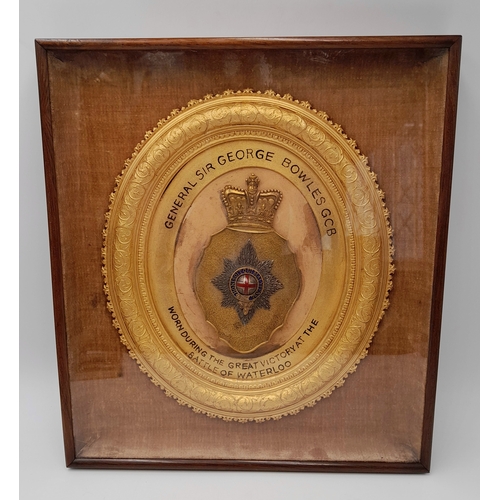A Coldstream Guards Shako Plate - Worn by General Sir George Bowles During the Battle of Waterloo. Displayed in a period frame with hanging cable to rear. Case - 28 x 32cm.