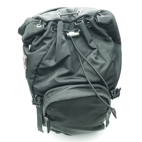 A Prada Black and Multi-Colour Logo Backpack. Textile exterior with ...