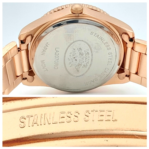 1001 - A LAURA ASHLEY, ROSE GOLD TONE, LILAC DIAL, BRACELET WATCH. IN FULL WORKING ORDER, AS NEW, IN ORIGIN... 
