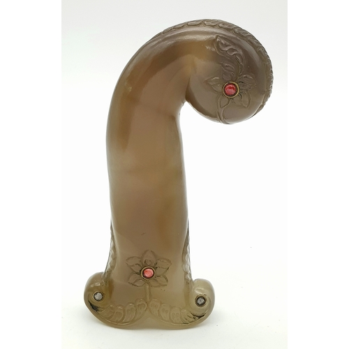 65 - An Antique Indian Mughal Agate Large Dagger Handle. Hand carved floral decoration with ruby and diam... 