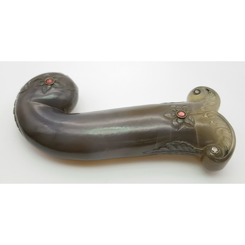 65 - An Antique Indian Mughal Agate Large Dagger Handle. Hand carved floral decoration with ruby and diam... 