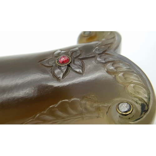 65 - An Antique Indian Mughal Agate Large Dagger Handle. Hand carved floral decoration with ruby and diam... 