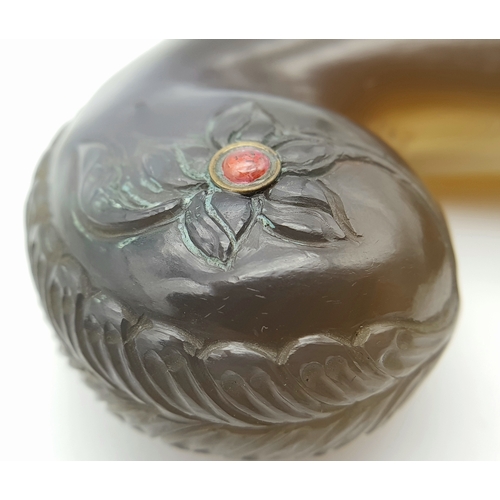 65 - An Antique Indian Mughal Agate Large Dagger Handle. Hand carved floral decoration with ruby and diam... 