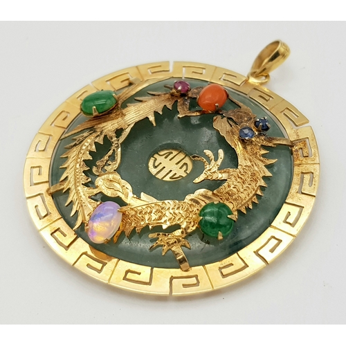 207 - An Antique Chinese Gold and Jade Double Dragon Gem-set Pendant. Greek key decorative border. Stones ... 