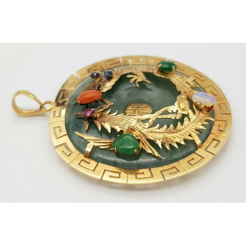 207 - An Antique Chinese Gold and Jade Double Dragon Gem-set Pendant. Greek key decorative border. Stones ... 