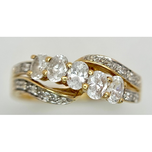 319 - A 14K Yellow Gold White Zircon Crossover Ring. Bright stones. Size Q. 3.25g. Ref: 639121