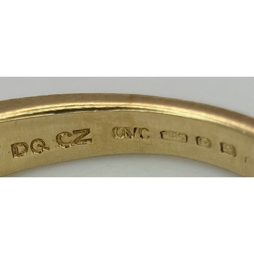 319 - A 14K Yellow Gold White Zircon Crossover Ring. Bright stones. Size Q. 3.25g. Ref: 639121