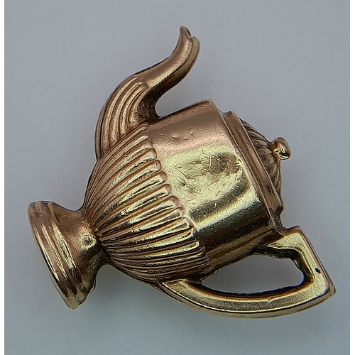 492 - A 9K Gold Coffee Pot Pendant. 2cm. 1.3g.