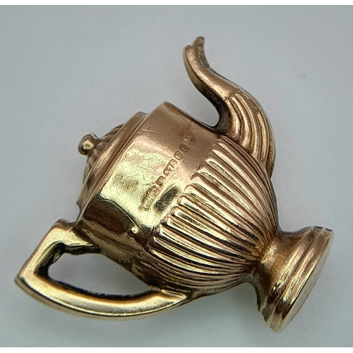 492 - A 9K Gold Coffee Pot Pendant. 2cm. 1.3g.