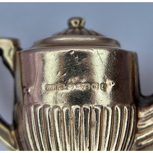 492 - A 9K Gold Coffee Pot Pendant. 2cm. 1.3g.