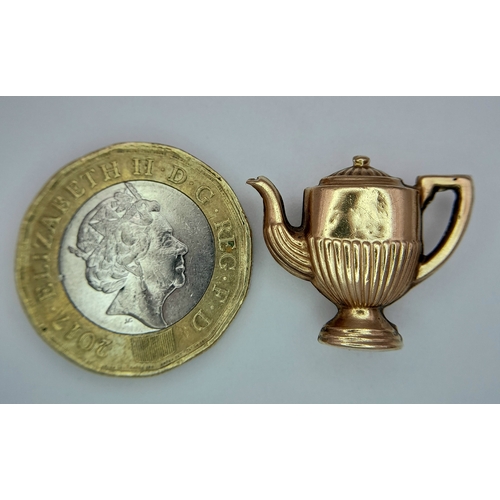 492 - A 9K Gold Coffee Pot Pendant. 2cm. 1.3g.