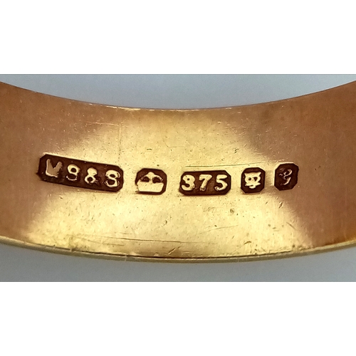 55 - A 9K Yellow Gold Band Ring. 6mm width. Size L. 2.2g.