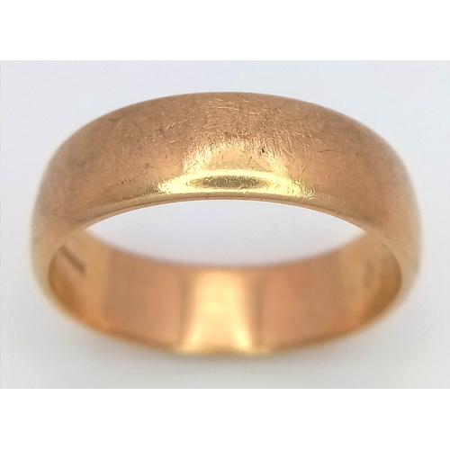 6 - A 9K Yellow Gold Band Ring. 7mm width. UK hallmarks. Size R. 5.3g.