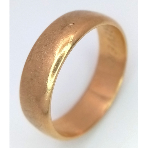 6 - A 9K Yellow Gold Band Ring. 7mm width. UK hallmarks. Size R. 5.3g.