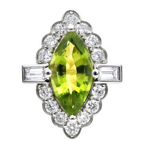 361 - An 18K Yellow Gold and Platinum, natural Peridot and Diamond Ring. Peridot - 2.57ct. Diamond - 0.96c... 