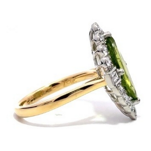 361 - An 18K Yellow Gold and Platinum, natural Peridot and Diamond Ring. Peridot - 2.57ct. Diamond - 0.96c... 