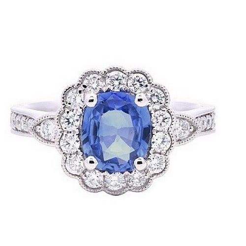 228 - A Platinum natural Blue Sapphire and Diamond Ring. Blue sapphire - 1.17ct. Diamond - 0.49ctw. Size M... 