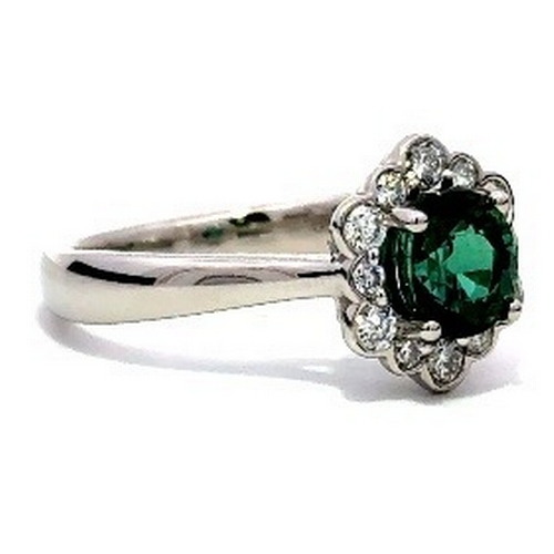 345 - A Platinum natural Green Tourmaline and Diamond Ring. Green tourmaline - 1.23ct. Diamond - 0.34ct. S... 