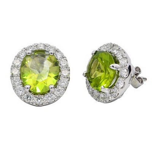 329 - A Pair of 9K White Gold Peridot and Diamond Dress Earrings. 4.53ctw peridots. 1.10ctw diamonds. 4.49... 